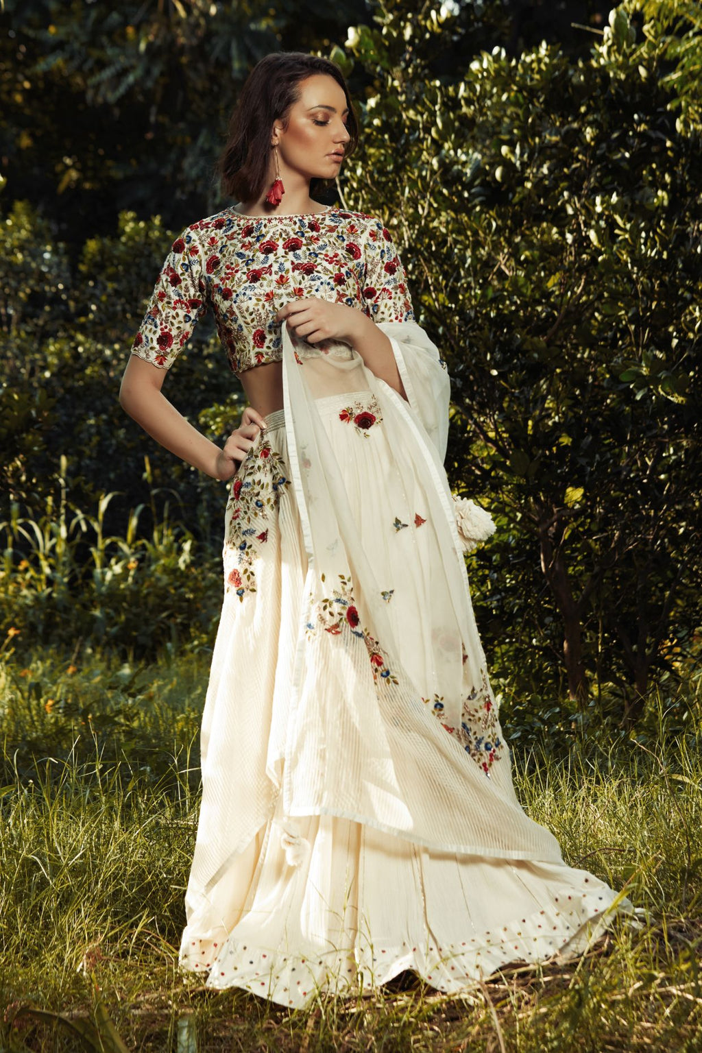 Ivory Lehenga With Multicoloured Embroidered Blouse And Dupatta
