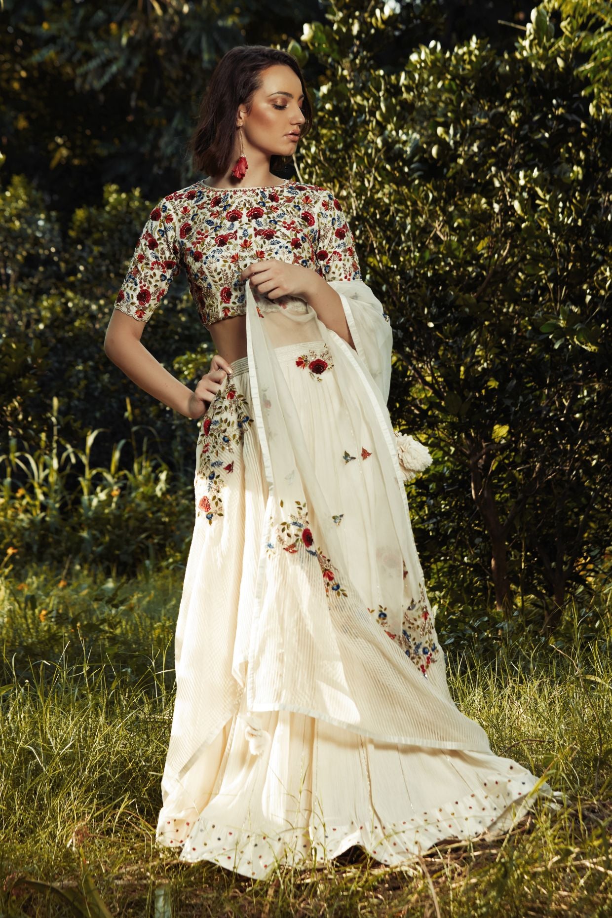 Ivory Lehenga With Multicoloured Embroidered Blouse And Dupatta