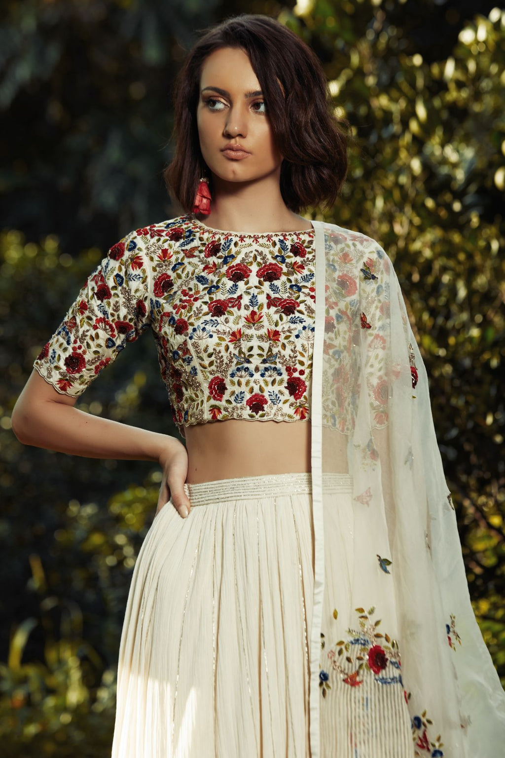 Ivory Lehenga With Multicoloured Embroidered Blouse And Dupatta