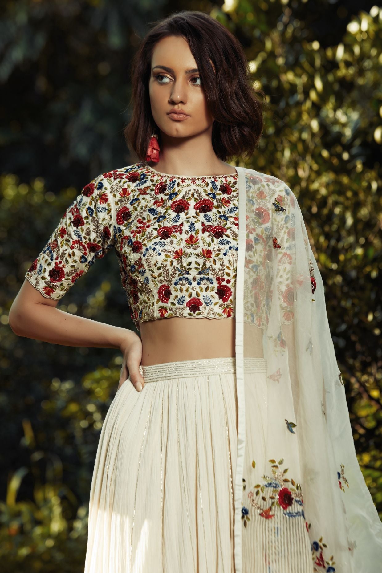 Ivory Lehenga With Multicoloured Embroidered Blouse And Dupatta