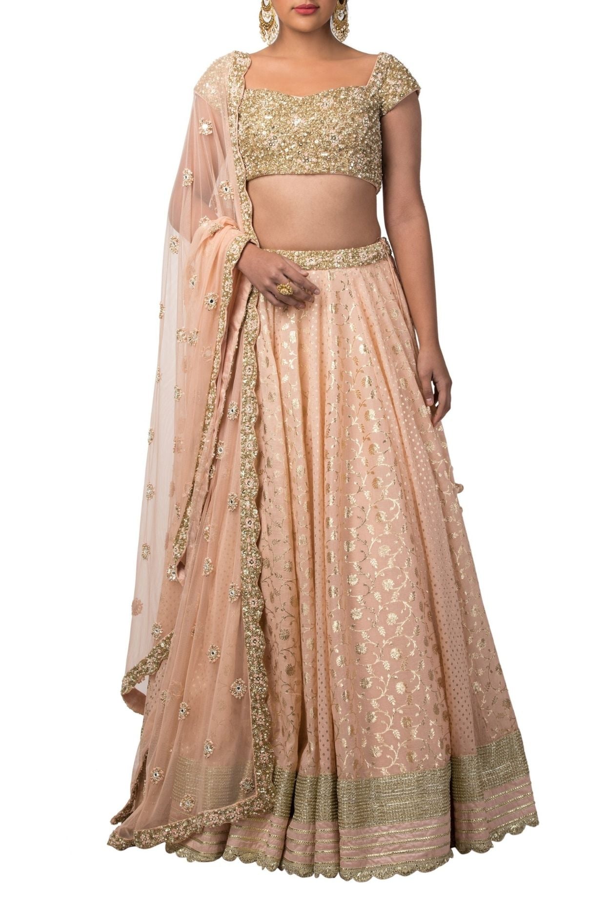SWEET PEACH CHIKAN LEHENGA SET WITH A COLOURED EMBROIDERED BLOUSE PAIRED  WITH A MATCHING DUPATTA AND SILVER EMBELLISHMENTS. - Seasons India